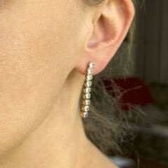 Altın Işıltılı Sıra Taşlı Uzun Küpeler